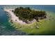 Aerial view of Beer Can Island, a popular boating destination with sandy shores and clear waters at 5910 La Rosa Ln, Apollo Beach, FL 33572