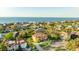 Panoramic aerial shot showcases a grand estate, manicured lawns, and coastal views at 5910 La Rosa Ln, Apollo Beach, FL 33572