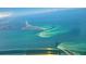 Stunning aerial view of the Apollo Beach coastline, showcasing pristine beaches and sparkling waters at 5910 La Rosa Ln, Apollo Beach, FL 33572