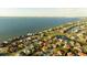 Waterfront neighborhood with canals, tropical landscaping, and single Gathering homes near Tampa Bay at 5910 La Rosa Ln, Apollo Beach, FL 33572