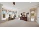 Bright bedroom featuring a cozy sitting area with large windows and an exterior access door at 5910 La Rosa Ln, Apollo Beach, FL 33572