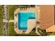Community waterfront pool with brick pavers, chaise lounges, and convenient bay access at 5910 La Rosa Ln, Apollo Beach, FL 33572