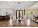 Grand foyer with high ceilings, travertine floors, and elegant decor creates a welcoming entrance at 5910 La Rosa Ln, Apollo Beach, FL 33572