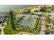 Community tennis courts with lush landscaping and a playground provide many recreational opportunities at 5910 La Rosa Ln, Apollo Beach, FL 33572