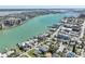 Panoramic aerial view of waterfront homes along the serene bay, showcasing stunning coastal living at 720 Bay Esplanade, Clearwater Beach, FL 33767