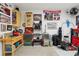 Garage featuring storage, refrigerator, compressor, toolbox, and vintage decor at 720 Bay Esplanade, Clearwater Beach, FL 33767