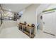 Hallway with decor and a view of the stairwell at 720 Bay Esplanade, Clearwater Beach, FL 33767