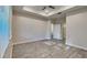 Large bedroom featuring wood-style tile flooring, recessed lighting, and a ceiling fan at 8563 Starlight Loop, Parrish, FL 34219
