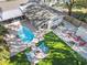 Aerial view of home with backyard oasis, pool, and outdoor living area at 9016 Bay Ne St, St Petersburg, FL 33702