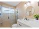 Modern bathroom with a glass-enclosed shower, vanity, and stylish fixtures at 9016 Bay Ne St, St Petersburg, FL 33702