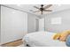 Bright bedroom with large closet, ceiling fan, and neutral color scheme at 9016 Bay Ne St, St Petersburg, FL 33702