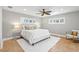 Serene bedroom with neutral colors, plush carpet, and ample natural light at 9016 Bay Ne St, St Petersburg, FL 33702