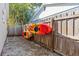 A pair of kayaks mounted on a wooden fence in an outdoor storage area at 9016 Bay Ne St, St Petersburg, FL 33702