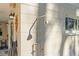 Convenient outdoor shower on the exterior of the home, perfect for rinsing off after a swim at 9016 Bay Ne St, St Petersburg, FL 33702