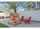 A cozy firepit area with chairs, perfect for outdoor entertaining at 9016 Bay Ne St, St Petersburg, FL 33702