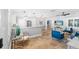 Stylish living room featuring tile floors and an open layout flowing into the kitchen at 9016 Bay Ne St, St Petersburg, FL 33702