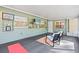 Cozy sunroom featuring neutral decor and multiple windows for natural light at 9016 Bay Ne St, St Petersburg, FL 33702