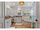 Luxurious bathroom features double vanities, granite countertops, soaking tub, and glass enclosed shower at 9067 Cypress Trl, Seminole, FL 33777