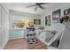 Light and airy bedroom with a soccer theme and a large window at 9067 Cypress Trl, Seminole, FL 33777