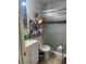 Modern bathroom with tiled walls, a sleek glass-enclosed shower, and a stylish vanity at 10002 Daffodil N St # 51, Pinellas Park, FL 33782