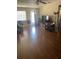 Spacious living room with hardwood floors, offering a welcoming and comfortable space at 10002 Daffodil N St # 51, Pinellas Park, FL 33782