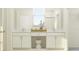 Bright bathroom with a double vanity, quartz countertop, and natural light at 11563 71St E Ave, Palmetto, FL 34221