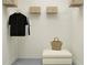 Bright closet features a shelf, hanging rack, clothes and ottoman at 11563 71St E Ave, Palmetto, FL 34221
