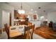 Dining room with view into kitchen and living room offering an open concept feel at 12339 Silton Peace Dr, Riverview, FL 33579