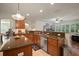 Open kitchen with granite countertops and stainless steel appliances at 12339 Silton Peace Dr, Riverview, FL 33579
