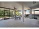 Screened patio area features ceiling fan, outdoor table and chairs, and gas grill at 12339 Silton Peace Dr, Riverview, FL 33579