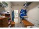 Organized walk-in closet with shelving and hanging space, leading to a bathroom at 12339 Silton Peace Dr, Riverview, FL 33579