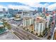 Striking aerial view of upscale condos and apartments set against a city skyline at 1238 E Kennedy Blvd # 703, Tampa, FL 33602