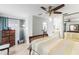 Comfortable main bedroom featuring light-colored walls, matching furnishings, and plenty of closet space at 12411 Eagleswood Dr # B, Hudson, FL 34667