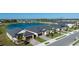 An aerial view of homes, showcasing the community's pond and nicely landscaped yards at 12688 Lily Quartz Loop, Parrish, FL 34219