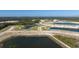 Wide aerial perspective showcasing the community's multiple ponds, landscaping, and roadways at 12688 Lily Quartz Loop, Parrish, FL 34219