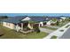 Charming single-Gathering homes boasting manicured lawns, brick-paved driveways, and well-maintained landscaping at 12688 Lily Quartz Loop, Parrish, FL 34219