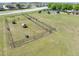 Aerial view of fenced community dog park area at 14422 Scottburgh Glen Dr, Wimauma, FL 33598