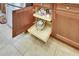 Kitchen cabinet with roll-out shelves, providing easy access and organized storage solutions at 15657 Aurora Lake Cir, Wimauma, FL 33598