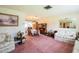 Open-concept space includes a living room with a dining area, perfect for entertaining at 1830 Oak Forest S Dr, Clearwater, FL 33759