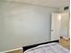 Spacious bedroom features neutral walls, wood floors and closet at 2226 Switzerland Way # 32, Clearwater, FL 33763