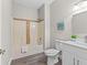Cozy bathroom with tiled shower-tub and vanity at 2442 Silvermoss Dr, Wesley Chapel, FL 33544