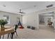 Spacious bedroom featuring neutral walls, ceiling fan, a cozy play area, and plenty of natural light at 2442 Silvermoss Dr, Wesley Chapel, FL 33544