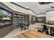 Inviting clubhouse featuring a library with many books, tables and a large screen television at 2442 Silvermoss Dr, Wesley Chapel, FL 33544