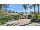 Exterior of a clubhouse showcasing architectural design and landscaping at 2442 Silvermoss Dr, Wesley Chapel, FL 33544