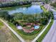 Landscaped entrance with the words Seven Oaks, fountains, and flower beds at 2442 Silvermoss Dr, Wesley Chapel, FL 33544