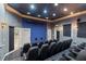 Enjoy a movie in this tiered theater room featuring comfortable seating at 2442 Silvermoss Dr, Wesley Chapel, FL 33544