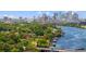 Waterfront properties with lush greenery and city views, highlighting the serene coastal living experience at 2519 N Riverside Dr, Tampa, FL 33602