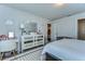 Bedroom with a vanity table, plush carpet, a mirrored dresser, and great natural light at 30226 Merilee Pl, Wesley Chapel, FL 33545
