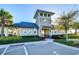Community clubhouse featuring a covered patio and beautifully landscaped surroundings, perfect for gatherings at 30226 Merilee Pl, Wesley Chapel, FL 33545