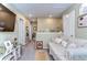 Upstairs hallway featuring a neutral color palette, recessed lighting, and cozy decor elements at 30226 Merilee Pl, Wesley Chapel, FL 33545